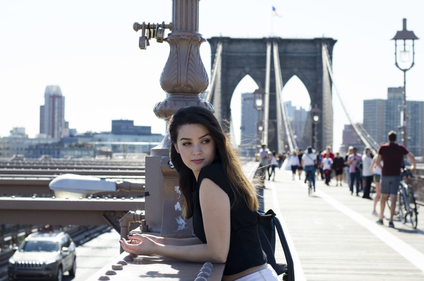 Leaning on Brooklyn Bridge